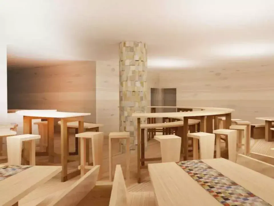 Image 3D de synthese realisee pendant la conception du projet, vue sur la salle a manger du refuge de l'Arpont en Savoie avec de grandes tables en bois et un magnifique pilier de pierre / Amenagement realise par ViolaDeco, Iana VIOLA